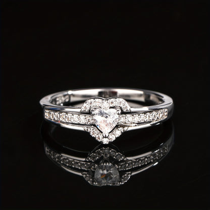 💍 It’s a sterling silver heart-shaped ring, 14k gold plated ✨, adorned with sparkling zirconia 💎. It features a trendy design 👗, symbolizes beauty 🌹 and romance ❤️, and comes in a premium gift box 🎁.